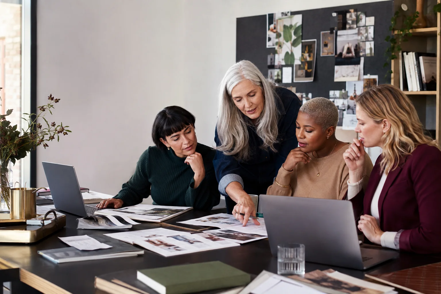 Diverse women editors comparing audience fit and publisher opportunities